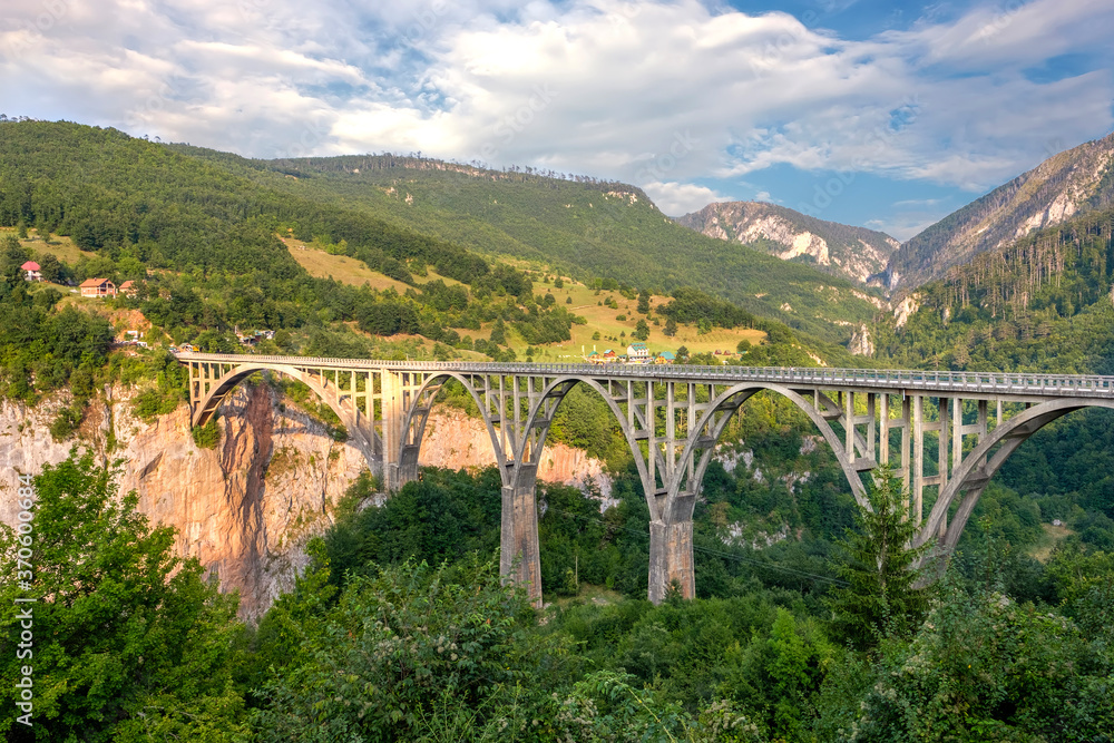 Mountain landscape, Montenegro. Durdevica Tara arc bridge in the mountains, One of the highest automobile bridges in Europe.