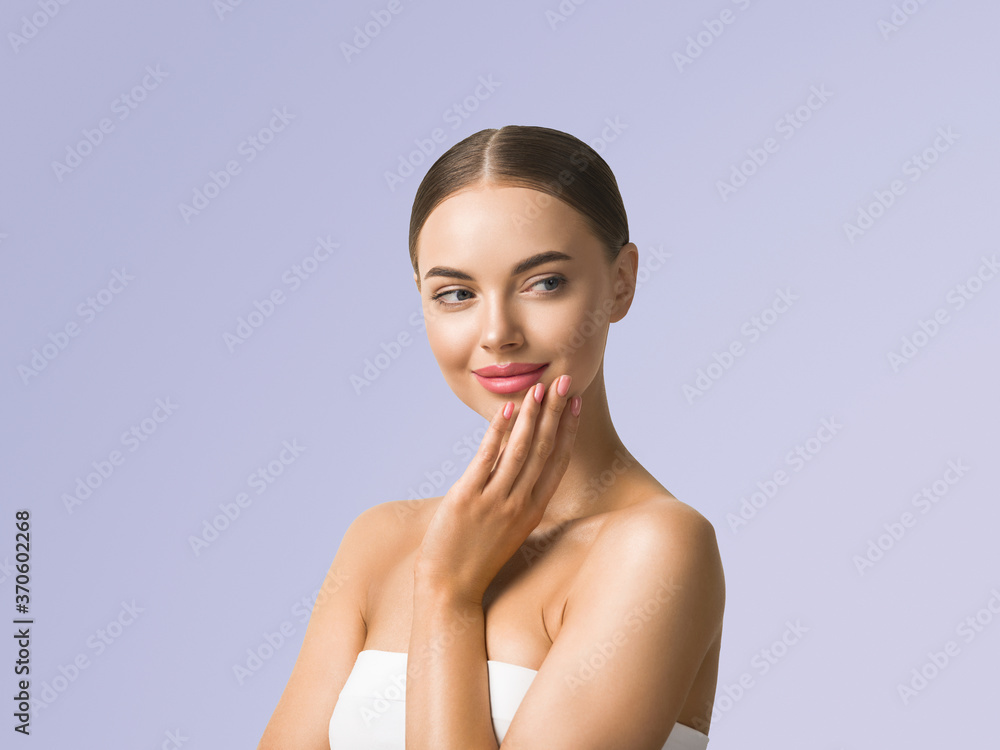 Beauty woman skin care beautiful female hand touching face cosmetic girl model over blue background Beauty woman skin care beautiful female hand touching face cosmetic girl model over blue background