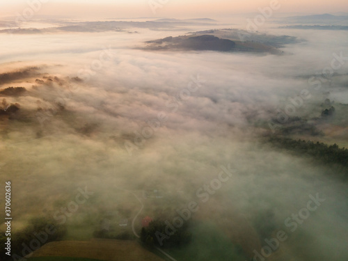 Breathtaking Sunrise in Lesser Poland. Rolling Hills,Mountains and Fog. Drone View © marcin jucha