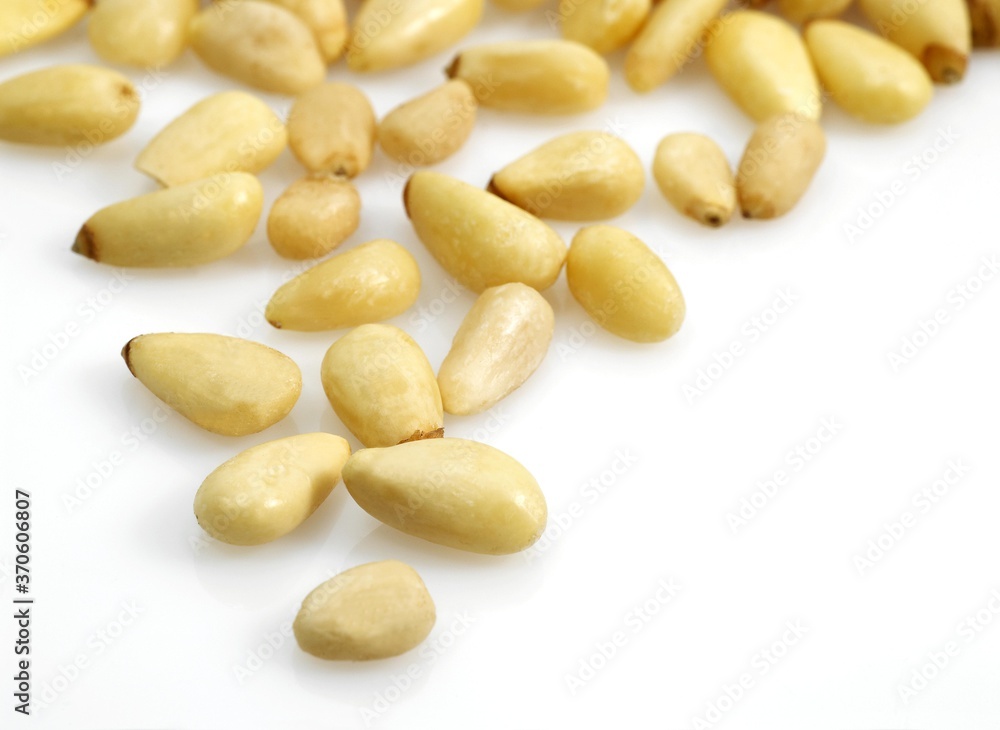 Pine Kernel or Pine Nut, pinus sp., Fruits against White Background Pine Kernel or Pine Nut, pinus sp., Fruits against White Background