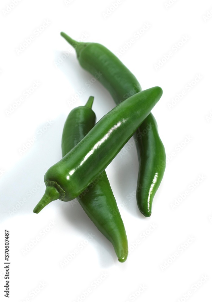 Green Chili Pepper, capsicum sp. against White Background