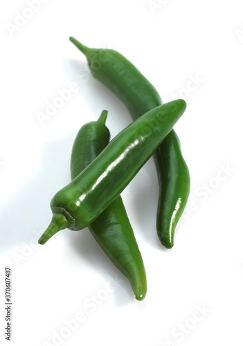 Green Chili Pepper, capsicum sp. against White Background