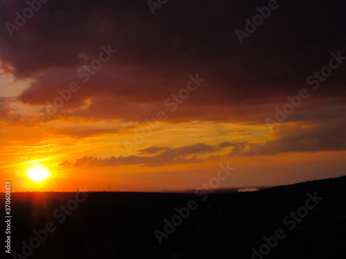 Colored sunset over the forest