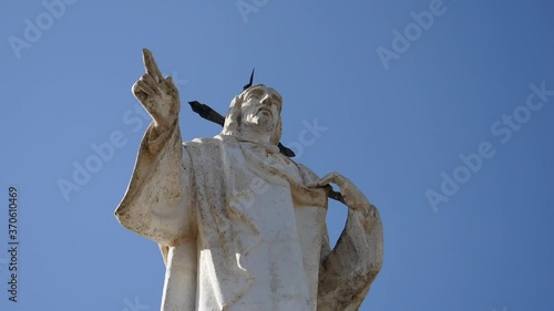 Upshot, Scenic view of Landmark statue of Christ in Sierra Espuna, Bright Blue Sky in the background. photo