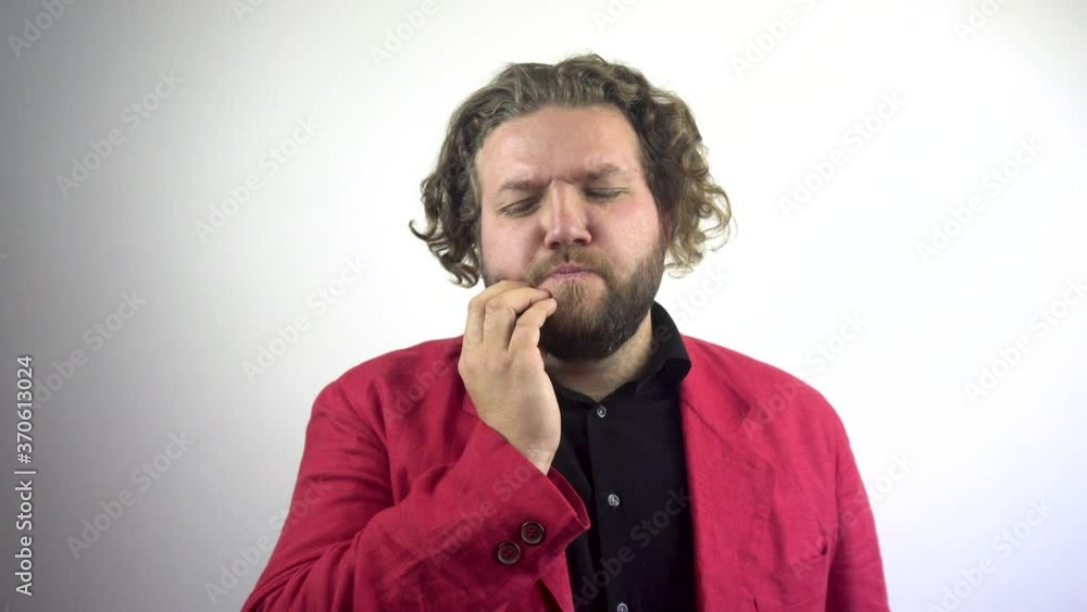 Young businessman with toothache. The man is massaging the jaw. The young man suffers from toothache.White background.4k Young businessman with toothache. The man is massaging the jaw. The young man suffers from toothache.White background.4k