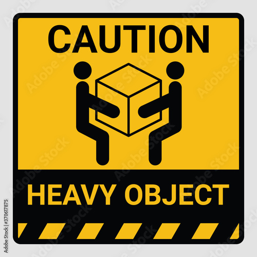 Caution heavy object two persons lift required symbol. Vector illustration of weight warning or beware sign cardboard isolated on gray Background. Label can be use on a box or packaging