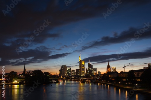 Frankfurt's skyline at evening blue hour and some lights already lit