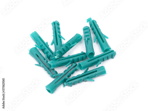 Heap of plastic dowels isolated