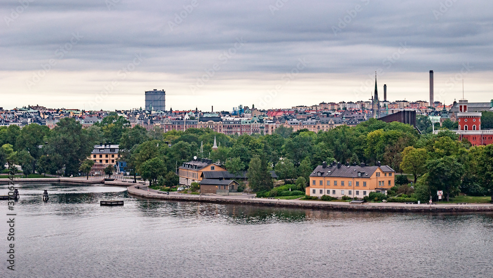 Obraz premium Panoramic view of different parts of Stockholm from the observation deck, cloudy summer day with blurry small fragments in the corners of the card