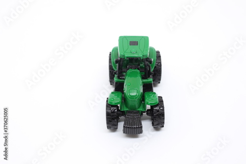 green tractor on white background