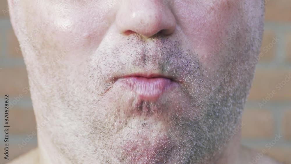 Selective focus. Man eats chicken nuggets harmful and tasty fast food. Close up Selective focus. Man eats chicken nuggets harmful and tasty fast food. Close up