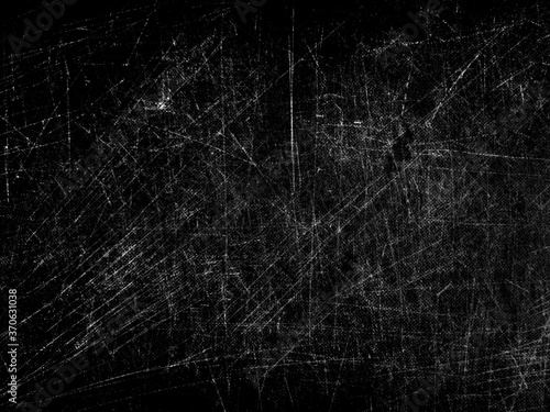 Black and white grunge scratch texture backdrop or overlay photo