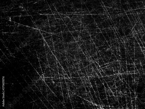 Black and white grunge scratch texture backdrop or overlay