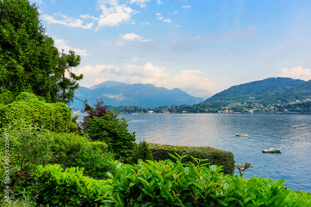 View of Lake Como, coastal towns and the surrounding mountains