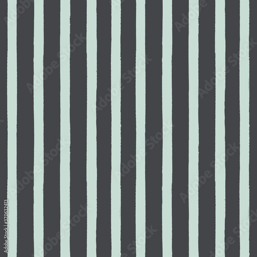 cute hand drawn doodle vertical stripes seamless pattern in charcoal grey and soft light mint