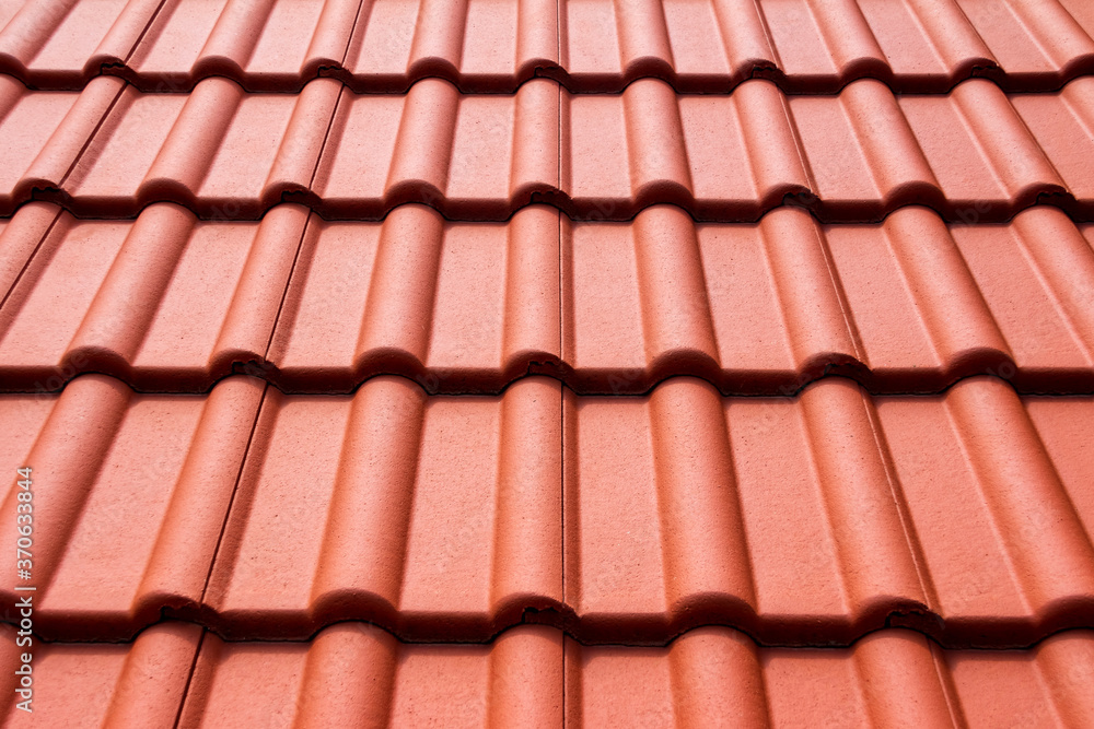 House roof with classical orange tiles, texture, background House roof with classical orange tiles, texture, background