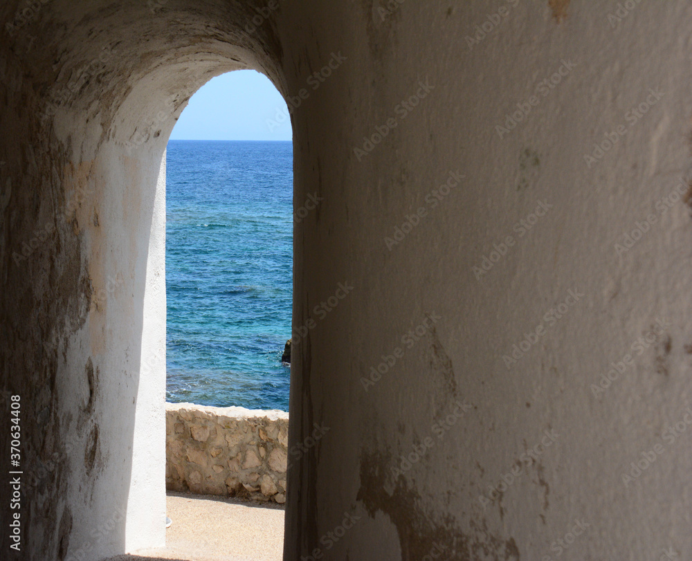 View through the window onto the blue sea