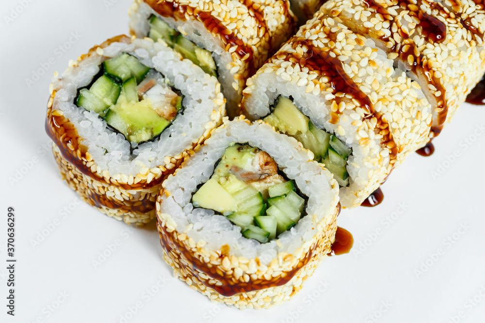 Japanese traditional food. Sushi rolls philadelphia classic with fresh eel and cream cheese and caviar Japanese traditional food. Sushi rolls philadelphia classic with fresh eel and cream cheese and caviar