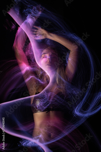 light painting erotic portrait, light drawing at long exposure, abstract colorful background 