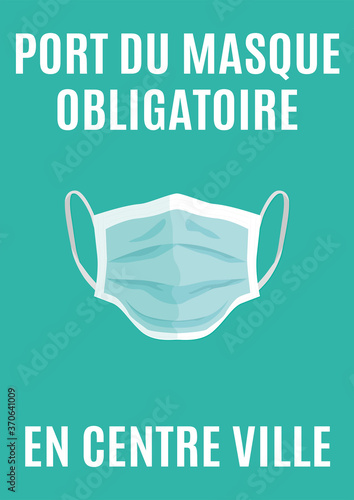 affiche pour le port du masque obligatoire en centre ville en blanc avec un masque blanc et vert sur un fond vert
