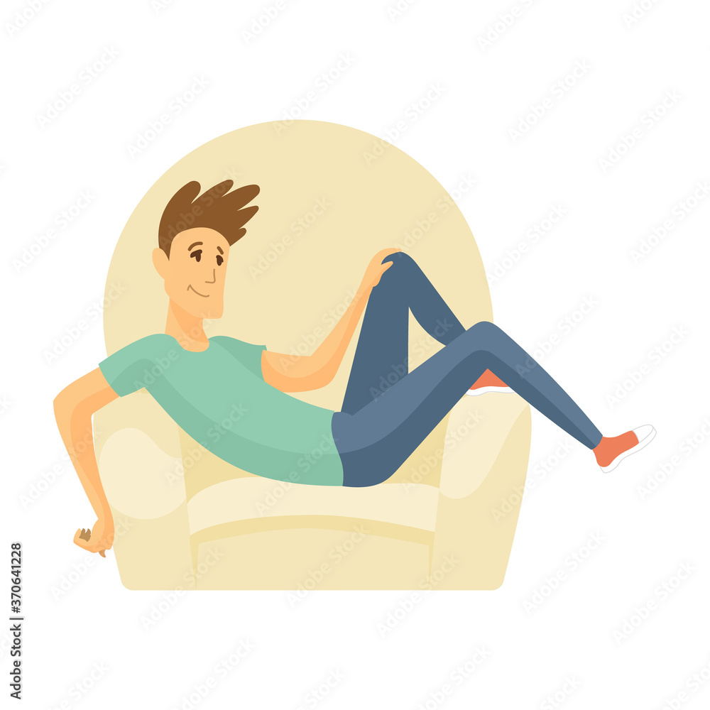 Home leisure. Boy sit on sofa. Young people leisure time. Staying at home. Enjoyed leisure time alone Home leisure. Boy sit on sofa. Young people leisure time. Staying at home. Enjoyed leisure time alone