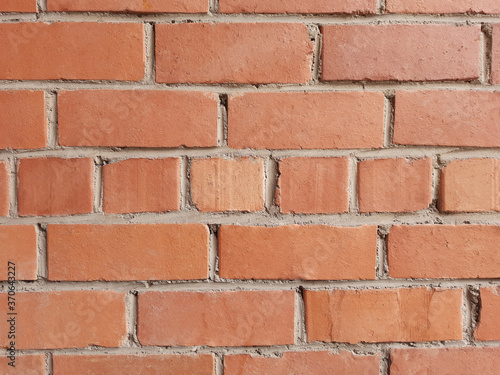 The texture of the walls of red brick. External part of the wall, brickwork.