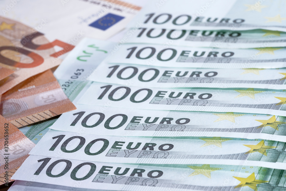 Heap of green houndred euro banknotes on each other Heap of green houndred euro banknotes on each other