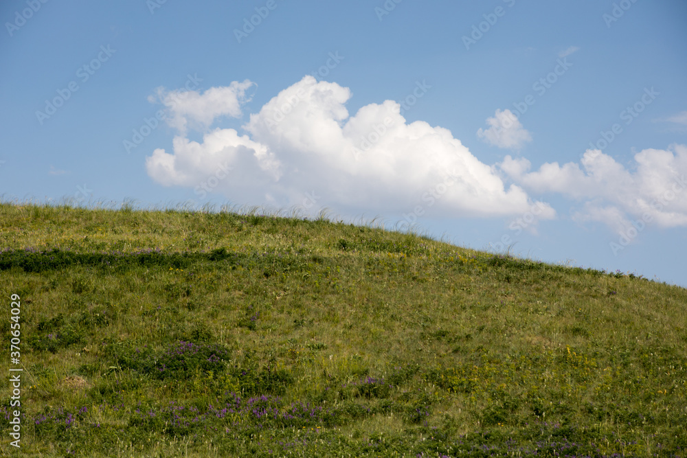 Beautiful landscape in the mountains at summer in daytime. Mountains at the sunset time. Azerbaijan, Caucasus. Khinalig Beautiful landscape in the mountains at summer in daytime. Mountains at the sunset time. Azerbaijan, Caucasus. Khinalig