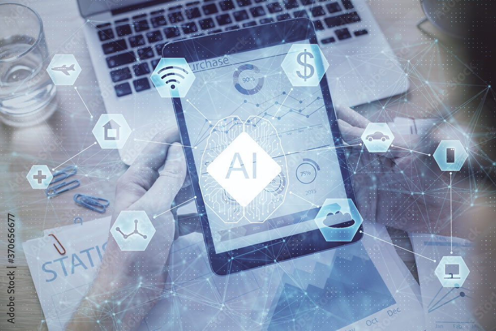 Double exposure of man's hand holding and using a digital device and data theme hologram drawing. Technology concept. Double exposure of man's hand holding and using a digital device and data theme hologram drawing. Technology concept.