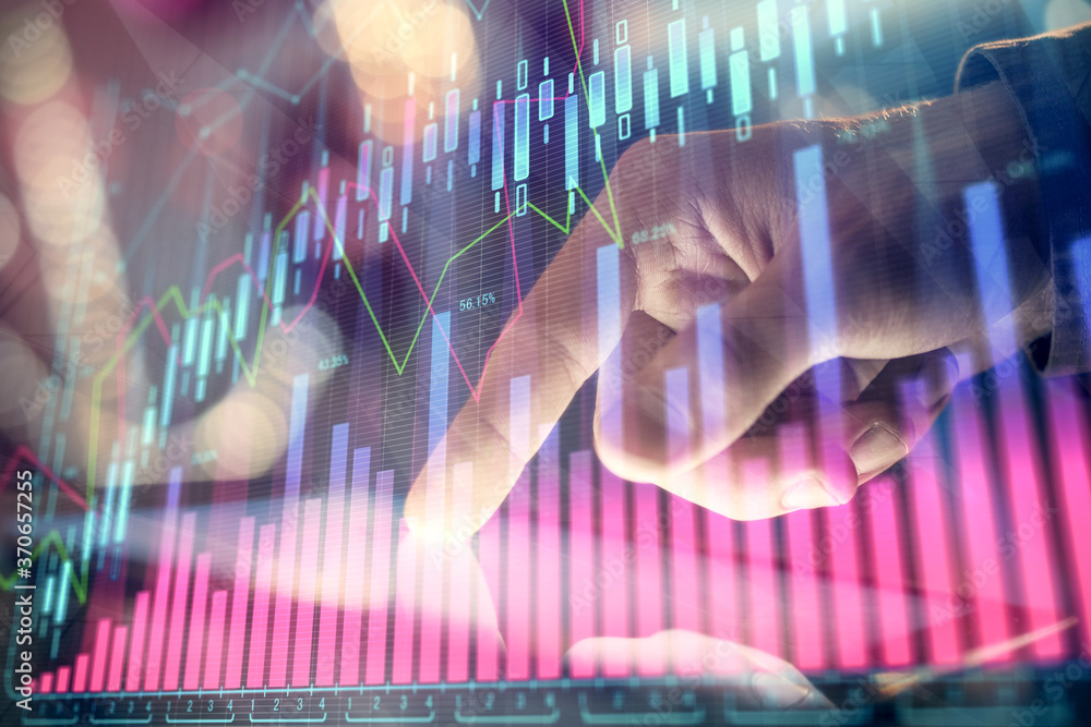 Multi exposure of man's hands holding and using a phone and financial chart drawing. Market analysis concept. Multi exposure of man's hands holding and using a phone and financial chart drawing. Market analysis concept.