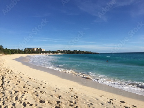 Landscape view of sandy beach coastline at sunrise