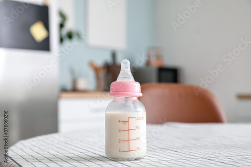 Bottle of milk for baby on ...