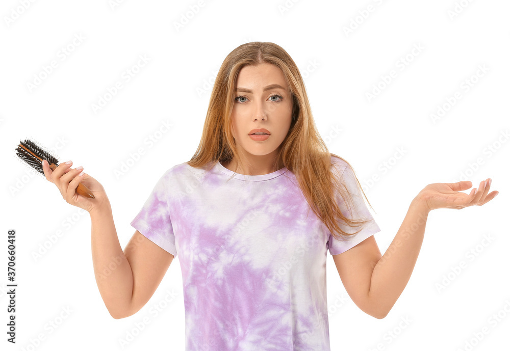 Stressed woman brushing hair on white background Stressed woman brushing hair on white background