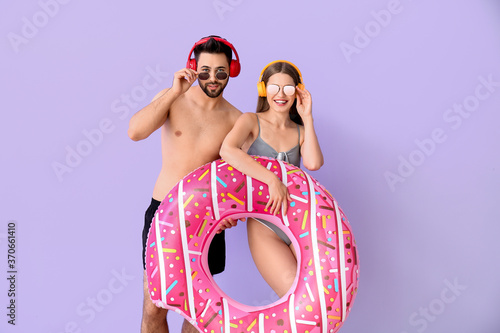 Young couple with headphone...