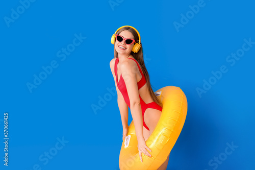 Young woman with headphones...