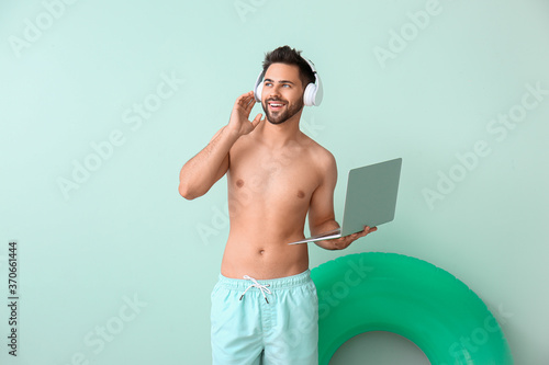 Young man with headphones a...