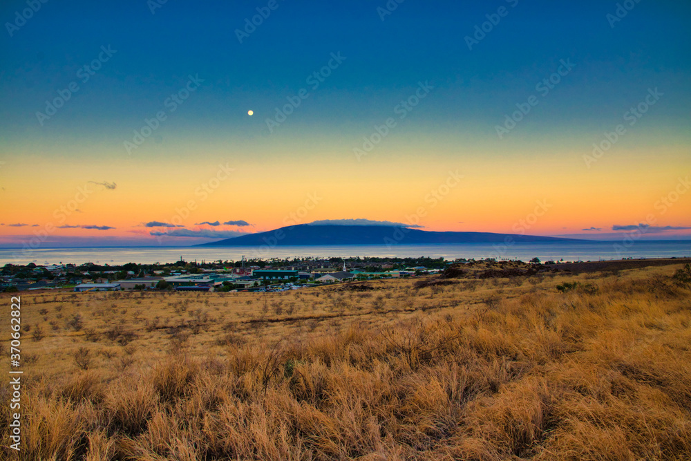 Surreal sky during moonset over Lahaina on Maui.
