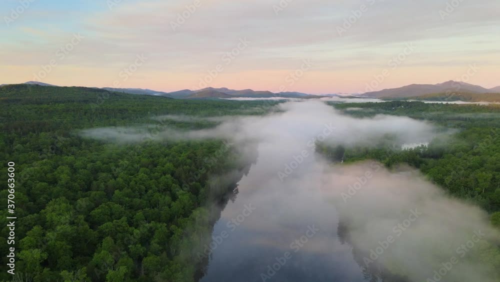 aerial sunrise view above river and fog in the mountains aerial sunrise view above river and fog in the mountains