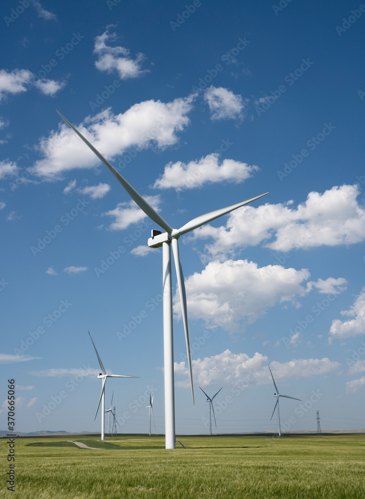 Green energy from windmills produced on a wind farm in Pincher Creek Alberta Canada. Green energy from windmills produced on a wind farm in Pincher Creek Alberta Canada.