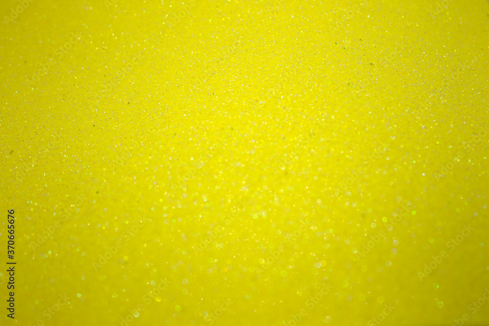 Yellow glitter holographic background Yellow glitter holographic background