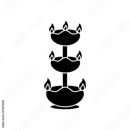 navratri fount with candles silhouette style icon