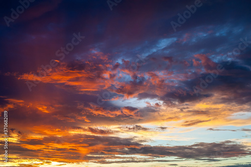 Colorful dramatic sky and cloud at sunset © Jeerayut