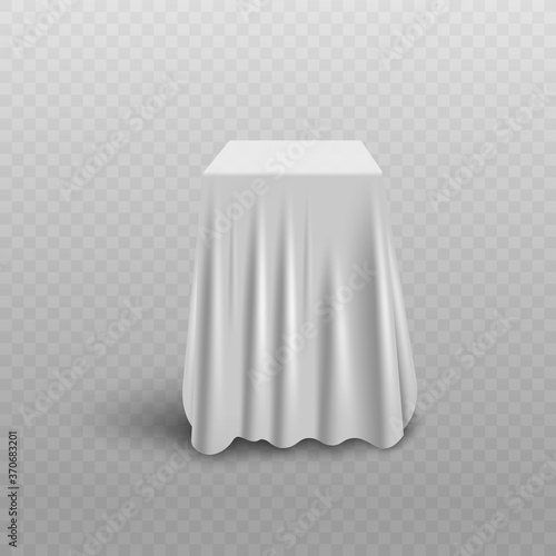 White curtain cover hiding cube shape object beneath