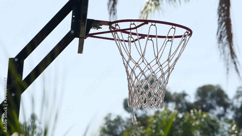 basketball hoop and net waving through the air in slow motion 240fps basketball hoop and net waving through the air in slow motion 240fps