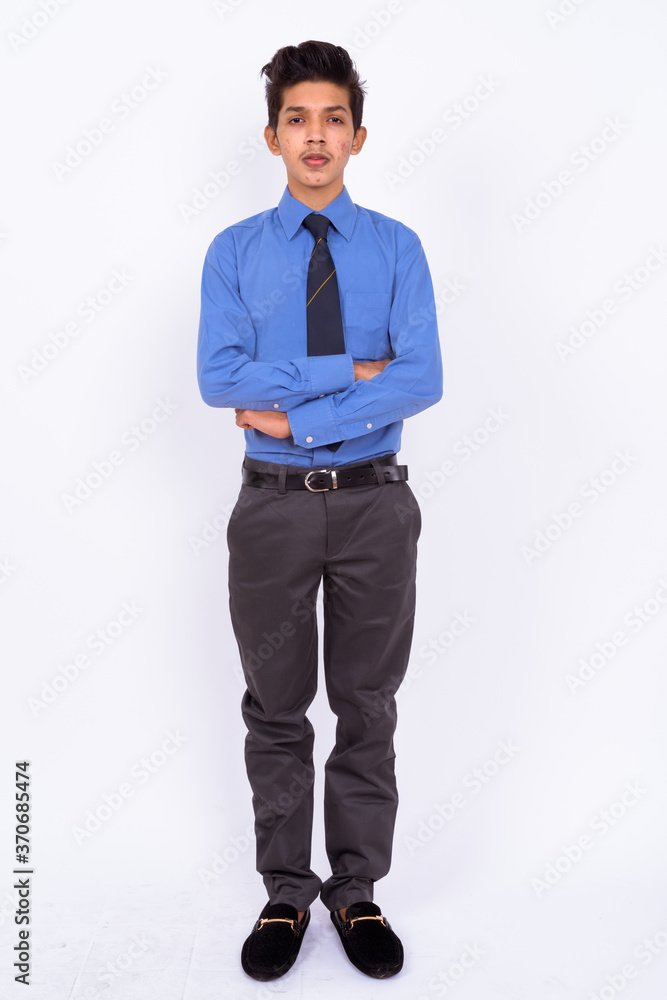 Portrait of young handsome Indian teenage boy as businessman Portrait of young handsome Indian teenage boy as businessman