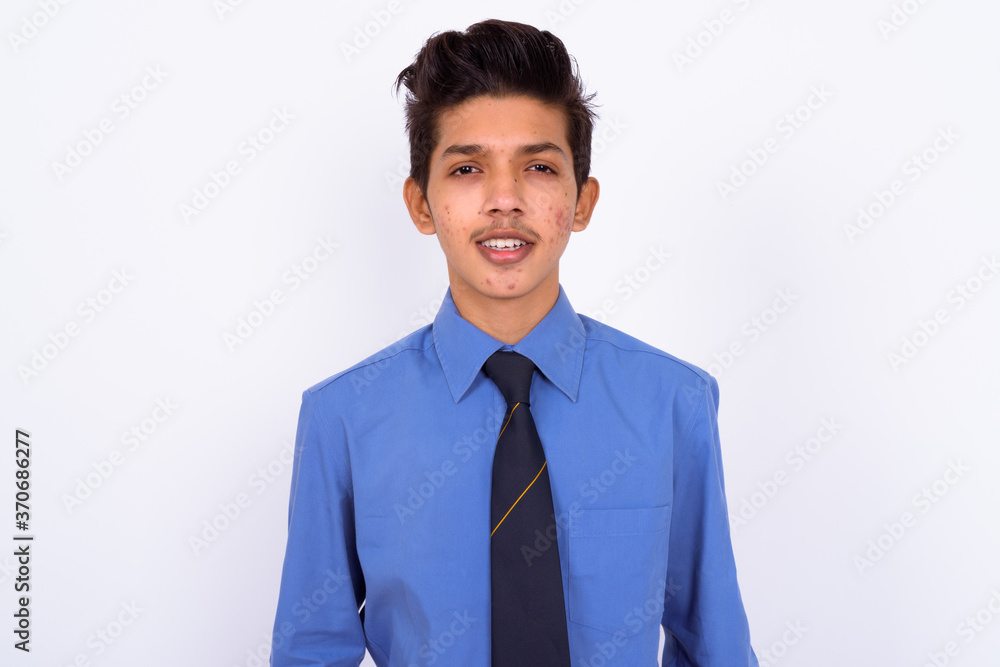 Portrait of young handsome Indian teenage boy as businessman Portrait of young handsome Indian teenage boy as businessman