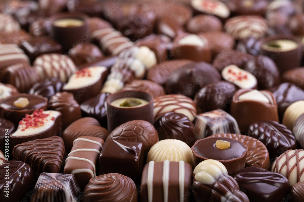 chocolate candy background, assorted sweetness, top view. chocolate candy background, assorted sweetness, top view.