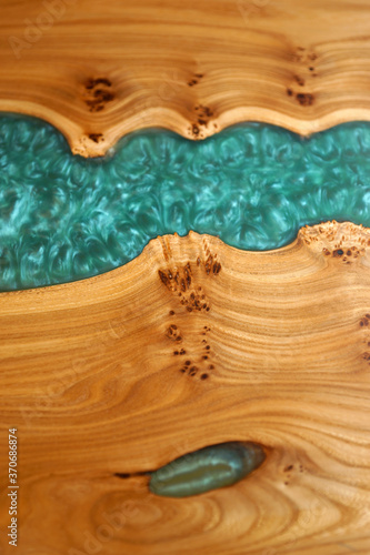 Wooden table with decorative epoxy resin