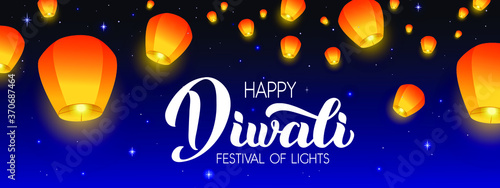 Happy Diwali - vector handwritten lettering. Modern calligraphy on night background with Flying Sky lanterns. Horizontal illustration for your poster, postcard, invitation or greeting card design.
