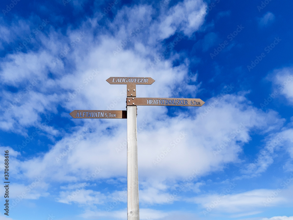 Directional sign pole indicating directions to laugavegur, alftavatn and hrafntinnusker. Directional sign pole indicating directions to laugavegur, alftavatn and hrafntinnusker.